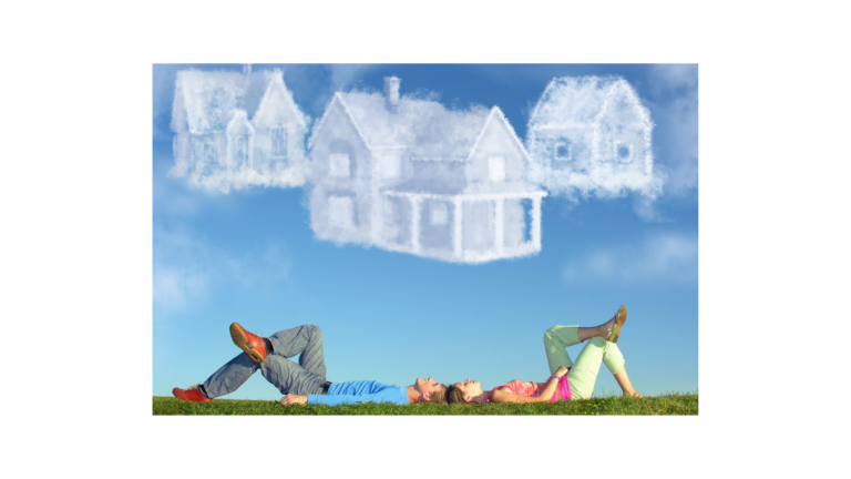 A man and woman lie on grass, looking up at a blue sky with clouds shaped like houses, symbolizing dreaming or planning for a future home.